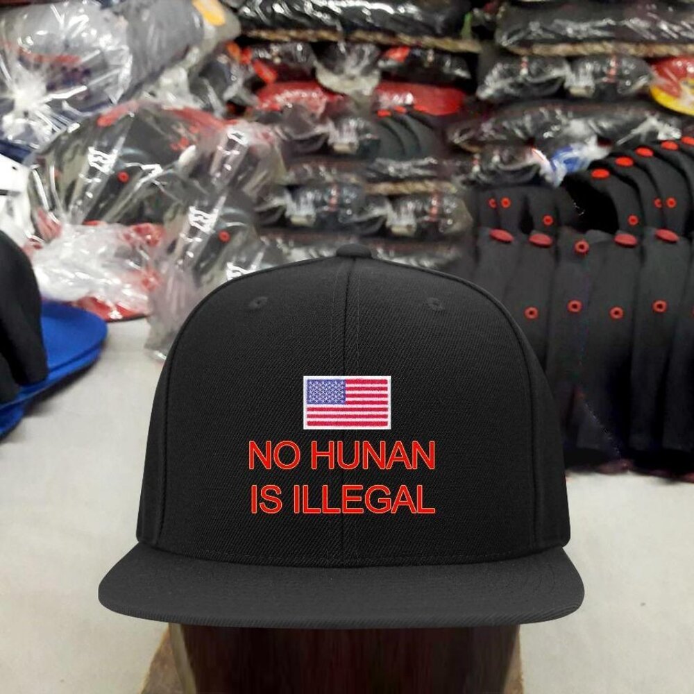 NO HUMAN IS ILLEGAL MEN'S CAP